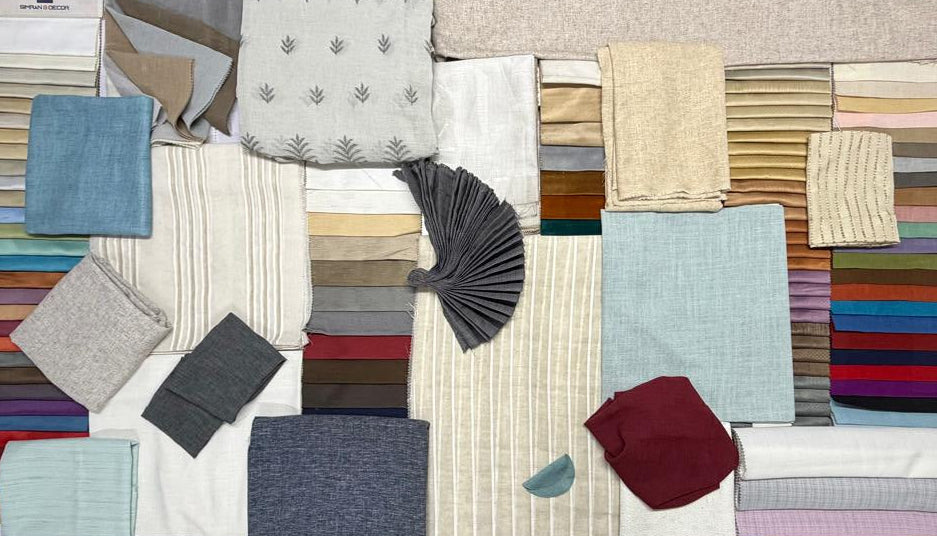 Collection of fabric swatches in various colors and textures on a white background